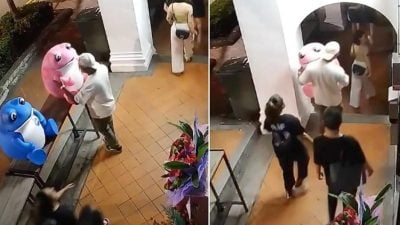 店外“青蛙”被抱走  老板报警男子归还