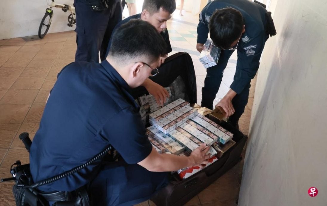 *已签发*柔：狮城二三事：弃狮城金文泰咖啡店旁  神秘行李箱藏私烟