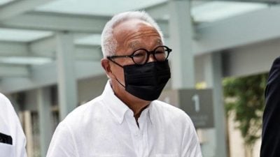 涉教唆狮城前交长犯罪  房产大亨王明星有意认罪