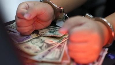 被控管理非法换汇货币   男子认罪 老板潜逃柬