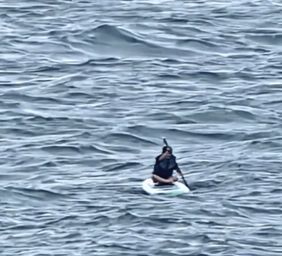 看世界两图)蝴蝶台风来袭 10岁男童海南漂流5小时获救