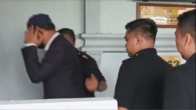 被控收7万贵重物品不认罪 隆工程局前主任2万保外