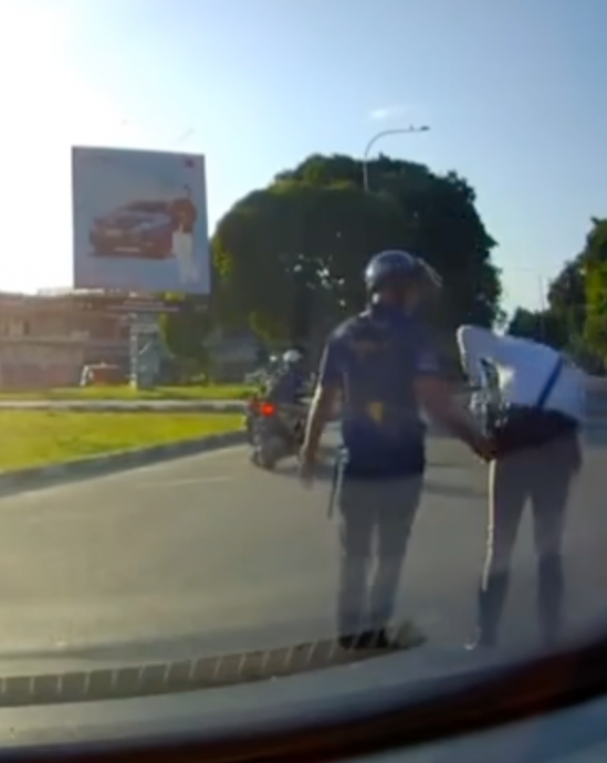视频|交警执勤飞来横祸 遭违规司机撞伤入院