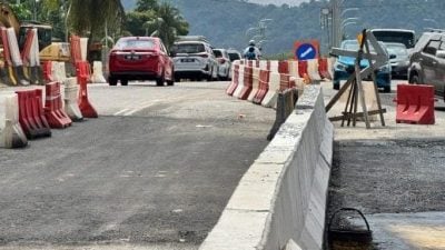 乌冷路甘榜马六甲前  临时U转路口永久关闭