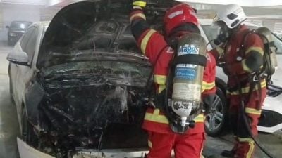 公寓地下停车场烟雾弥漫 车起火 11人吸浓烟送院