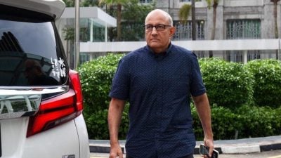 完成居家宵禁计划   狮城前交长易华仁获释