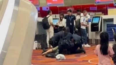 涉在樟宜机场辱骂公务员 女子被3警制伏逮捕