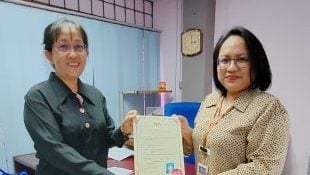 陈蓝珍领委任状 续任助理婚姻注册官