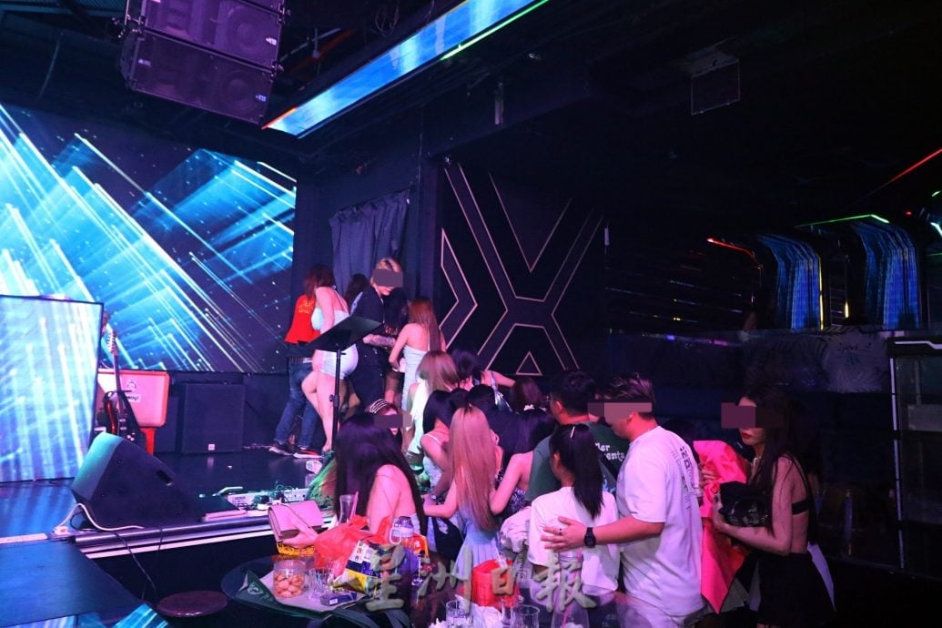 已签发:柔:版头之一:移民局午夜时分突击娱乐场所 扣236非法移民