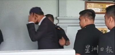 被控收7万贵重物品不认罪 隆工程局前主任2万保外