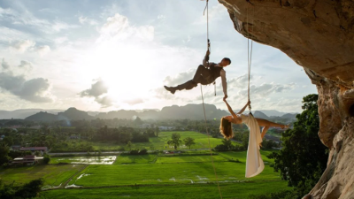 Rock climbing couple scale heights in wedding attire to mark new journey in life