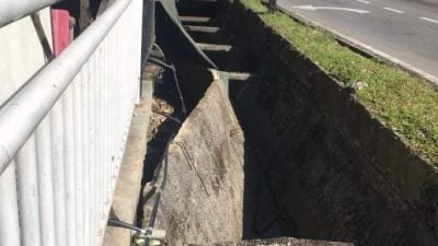 阿末莱市集沟墙塌 . 陈立仁通知市局速修筑
