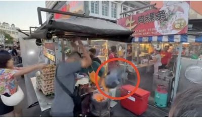 与小贩父子发生口角 男子怒掀翻炒锅