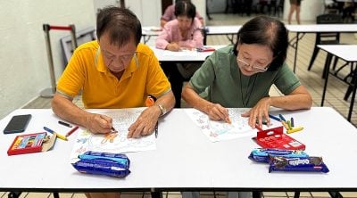 Grandpas, grandmas join children in coloring contest
