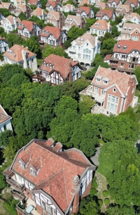 传刘特佐持伪造澳护照 居住在上海青山苑豪宅