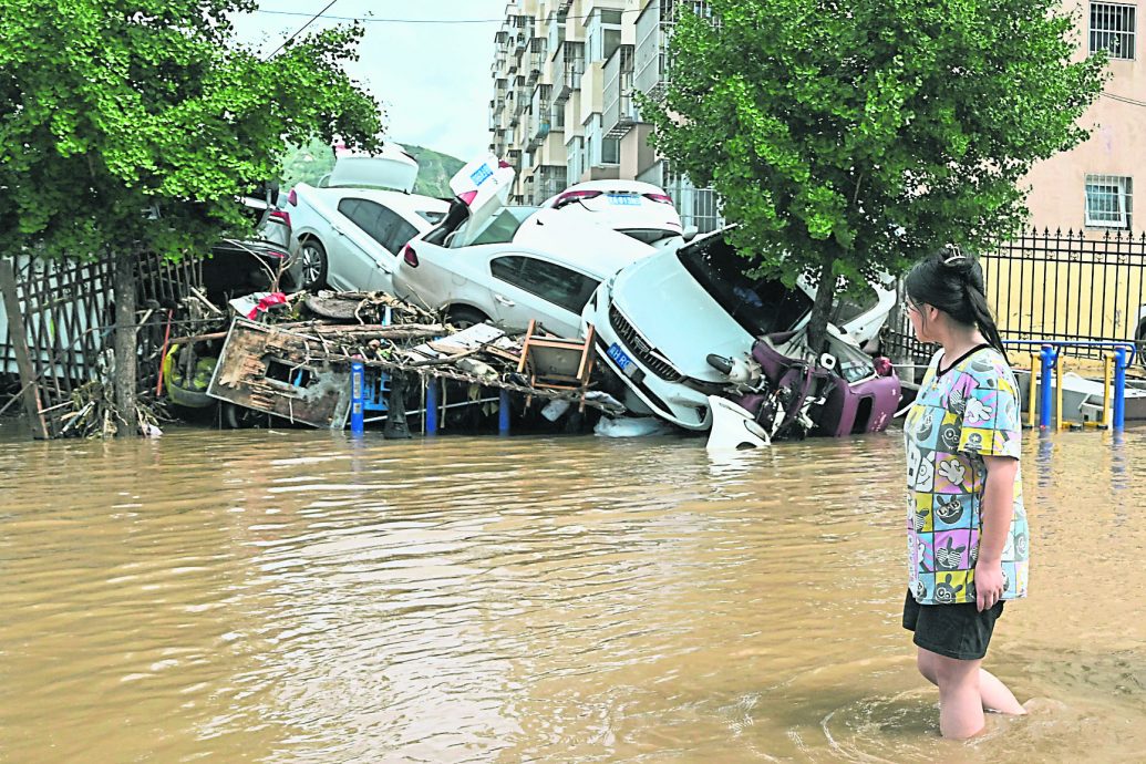 北京暴雨山洪38死