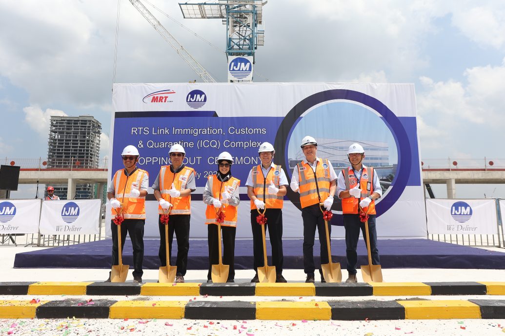 **即时国内**全国:柔新捷运武吉查卡关卡大楼封顶 主体建筑框架完工