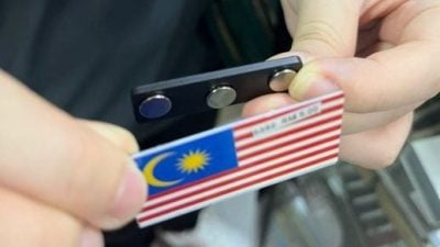 安全考量方便  缝制磁铁型国旗徽章 受青睐