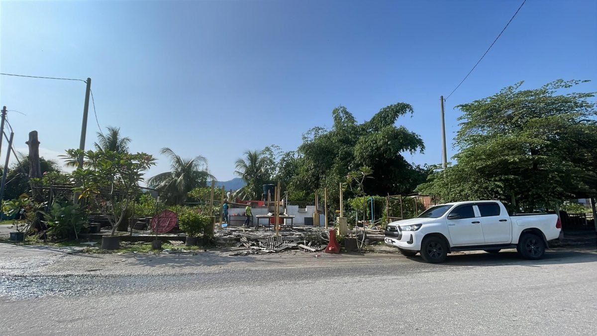 大都会封面副：占用政府地建商铺，拆/4图