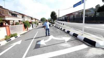 坡道路口高低落差逾呎   筑分界堤阻车U转“落坑”