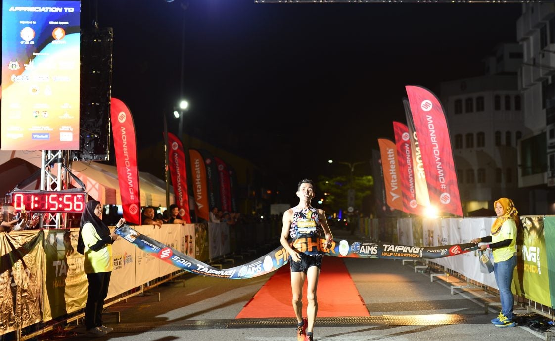 太平半程马拉松赛 欧阳仁光夫妇分夺冠军传佳话