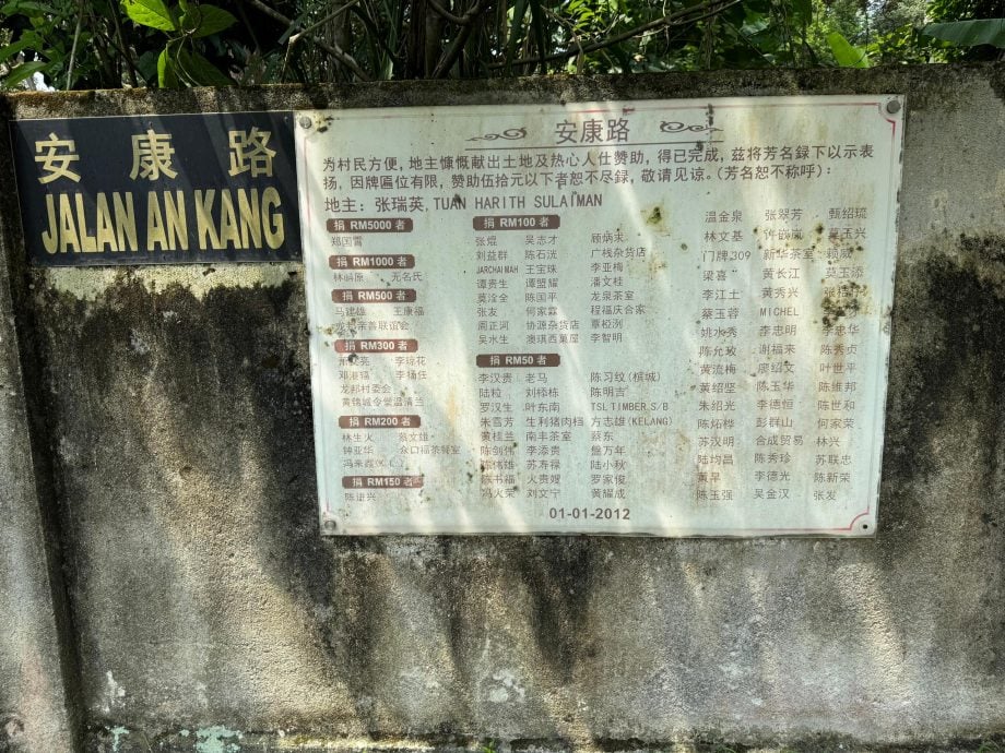 封面-大都会:诊所后门不开 龙邦人冒死兜路求医/8图