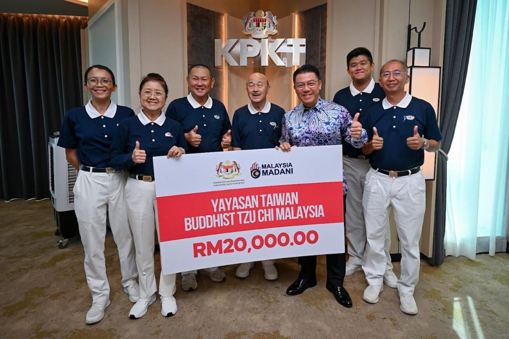 已签/倪可敏亲切接见慈济代表团 慈济总动员支持清洁大马日