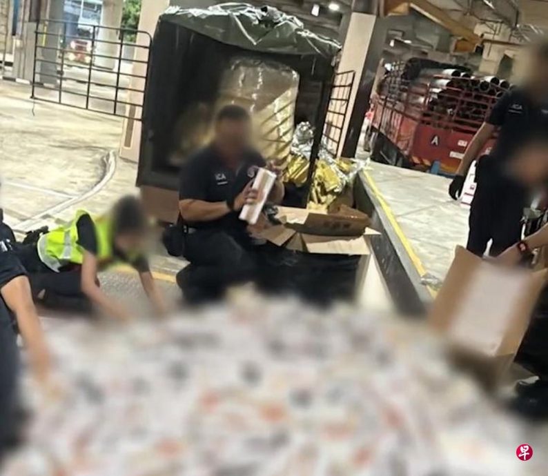 *已签发*柔:狮城二三事:大马罗里大士关卡入境狮城  移民局起逾5900条漏税烟