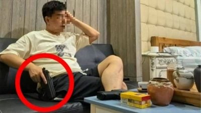 持枪拍照放上网炫耀 泰警登门捉中国男