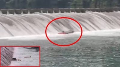 民众闯水坝禁区戏水遇溺 5消防员救人翻船2死1命危