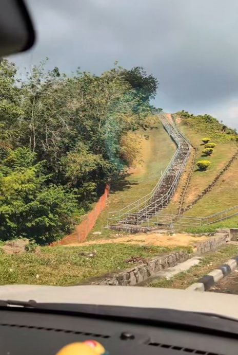 视频|好奇南北大道“人与山”路牌 民众爬上去收获惊喜