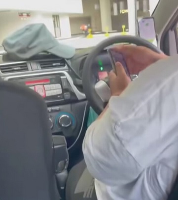 视频|搭电召车睡着被偷拍 司机被抓包称“玩玩而已！”