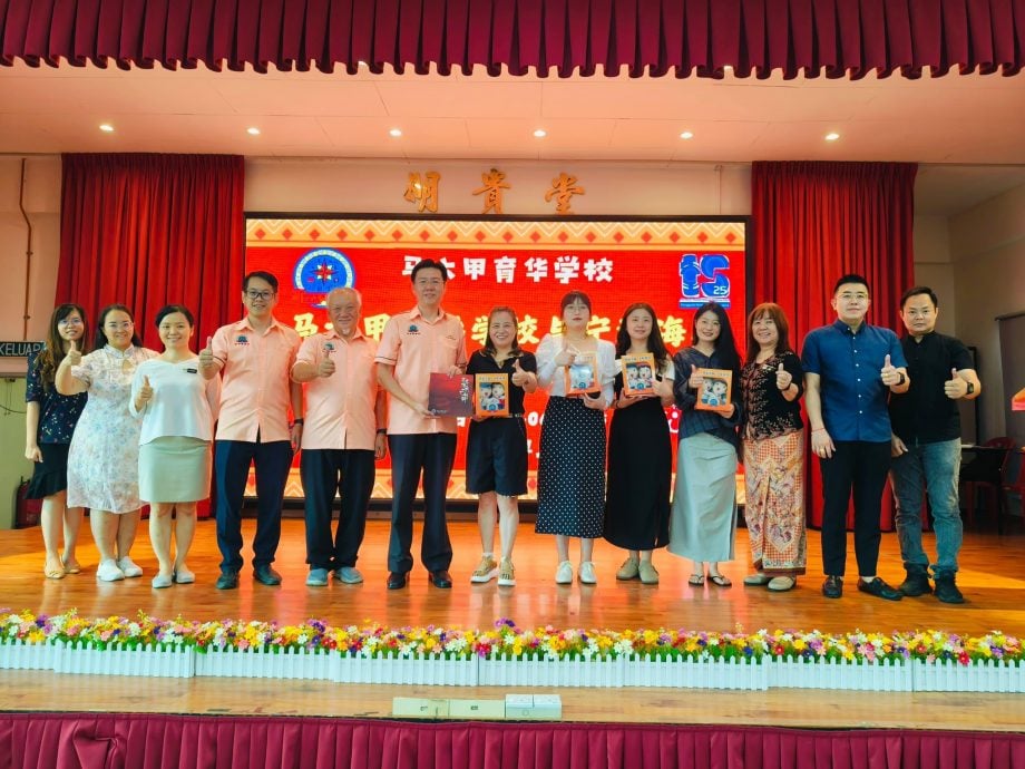 宁波市宁海海亮学校师生访育华学校