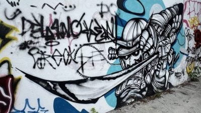 大街小巷成“画布”   街头涂鸦是创意或污染？