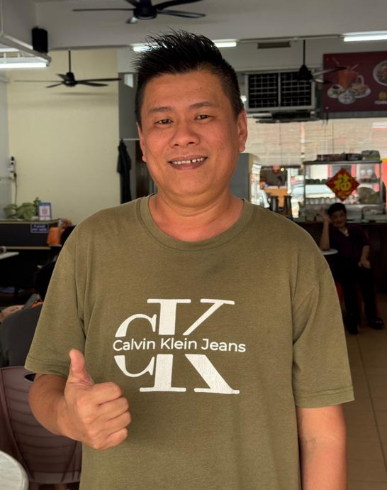 （古城第三版主文）顾客不再因堵车却步·玛琳商家挺取消红绿灯