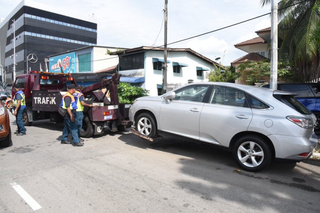 （大北马）修车厂违法将客户车停路边，市政厅开罚单拖吊车
