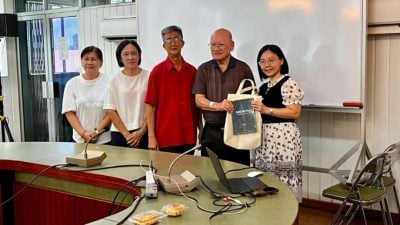 梁文明：举办说明会．商家学习电子发票