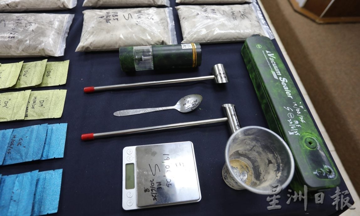 柔:版二头:大马通缉犯越南女贩毒,藏毒垃圾堆供买家自取