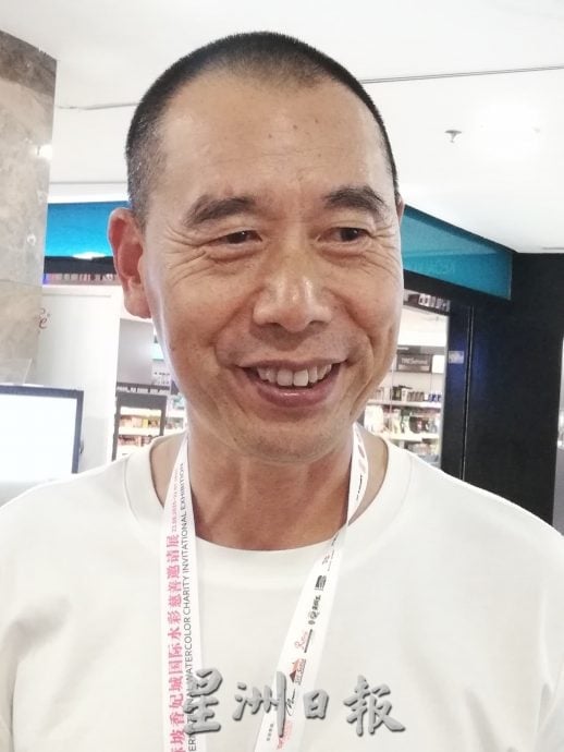 **已签发**柔:封面:逾20国内外画家联手绘制 《麻坡上河图》及《中化中学校景图》各10米长