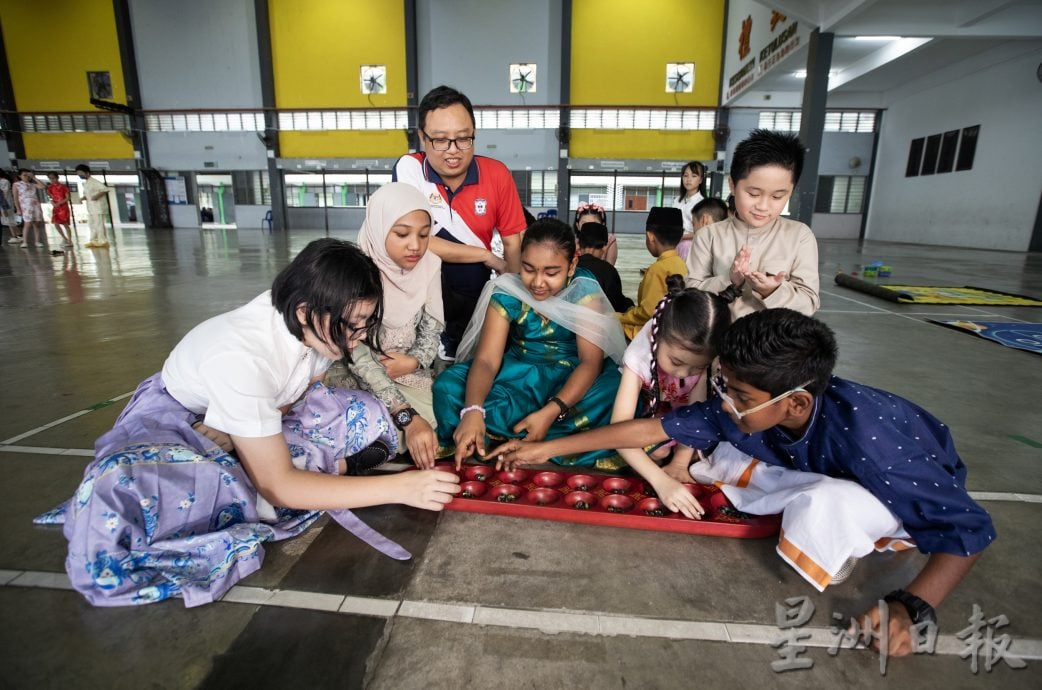 （21/7见报）星角摄／传统童玩游戏