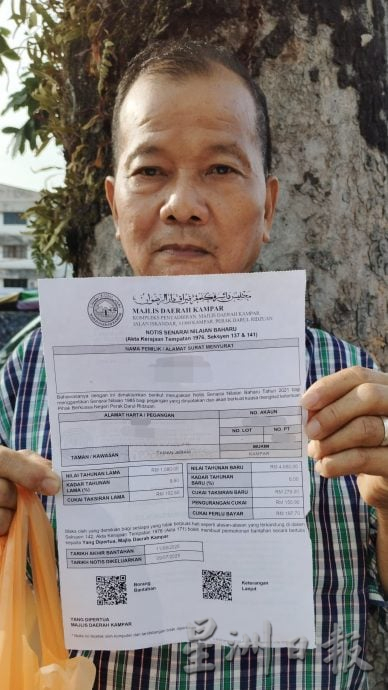 马华金宝区会巴刹征签 400人反对涨门牌税