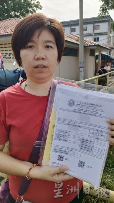 马华金宝区会巴刹征签 400人反对涨门牌税