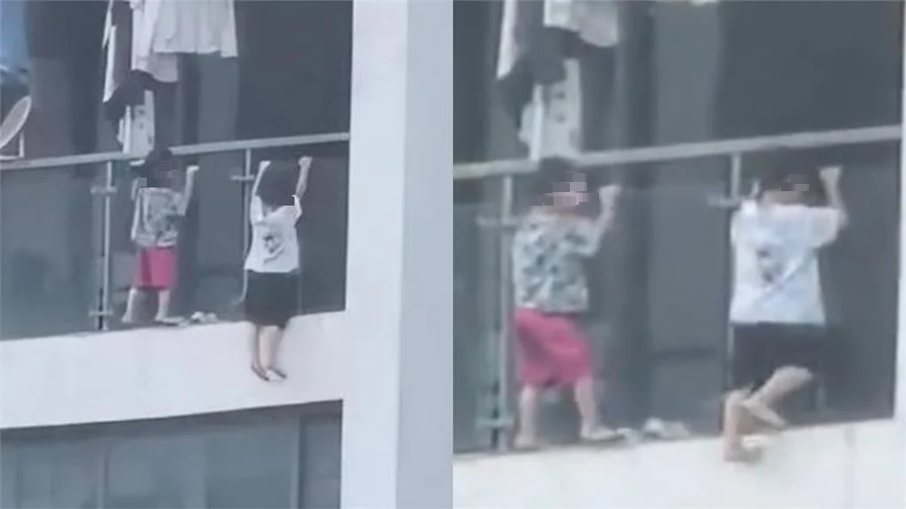 两幼童13楼阳台外“悬空吊单杠”　惊险画面曝光