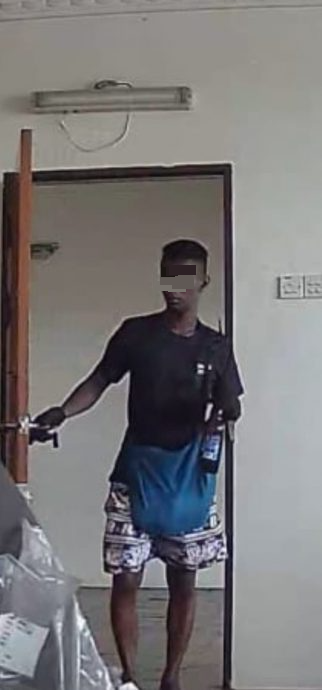 乌龙贼持刀入屋盗手机 人走留下半瓶酒