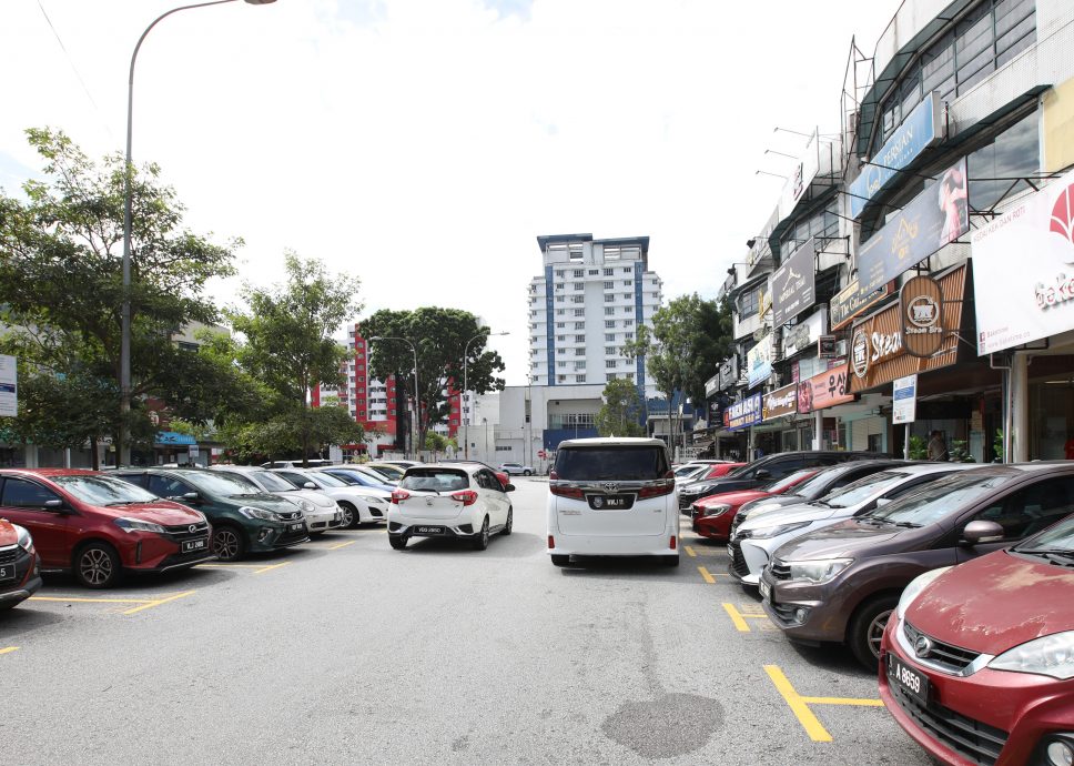 大都会/封面主文/跟进装摄像头摩托车巡逻队拍停车情况