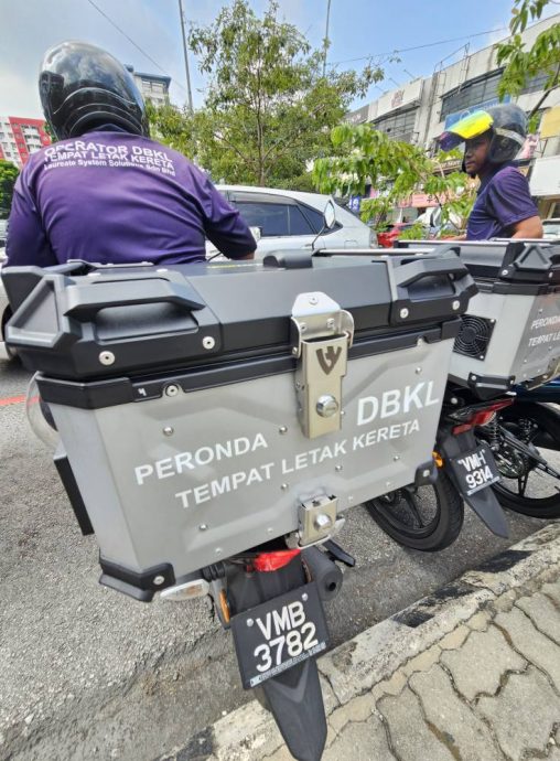 大都会/封面主文/跟进装摄像头摩托车巡逻队拍停车情况