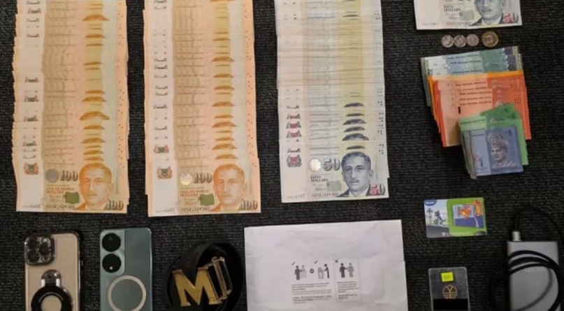 *已签发*柔:狮城二三事:冒充狮城政府官员行骗 大马男子被捕