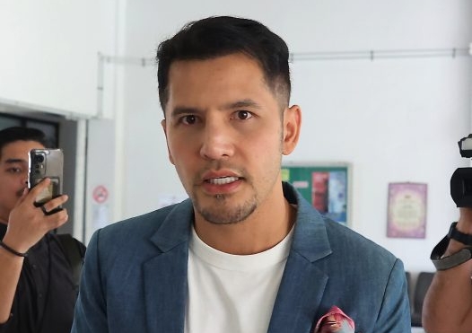 已签/艾瑾/通讯法部分字眼违宪 企业家无罪获释