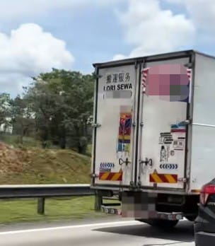 已签/货车车尾倒挂国旗 拍摄者感失望网民反应不一