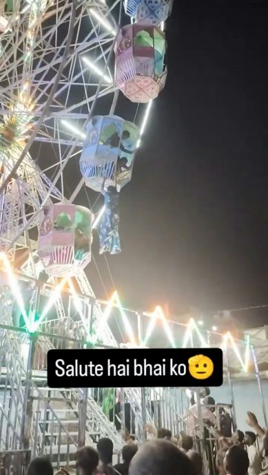 拚图三图)女游客“摔出摩天轮”男子9公尺高空救美